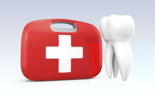 First aid kit with white medical cross next to 3D tooth model on blue background.